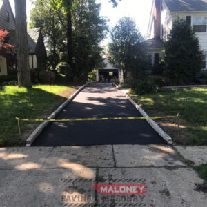 Asphalt driveway with interlock concrete stones in Shadowlawn Drive, Westfield