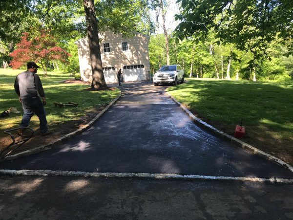 Our installation team paving a driveway in Roselle, Union County